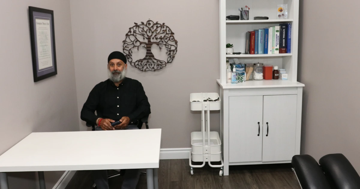 Consulting with a naturopathy professional in a calm, welcoming clinic setting learn what to expect for treatment costs and holistic care options in 2025